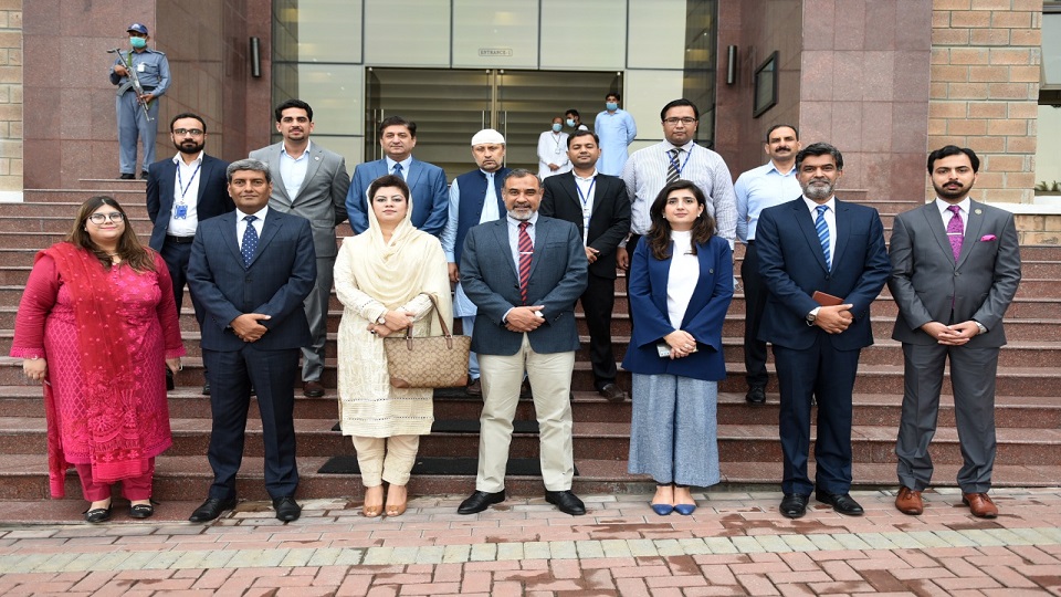 Group Photo with Chief Guest accompanied by Rector, NUST and organizing team