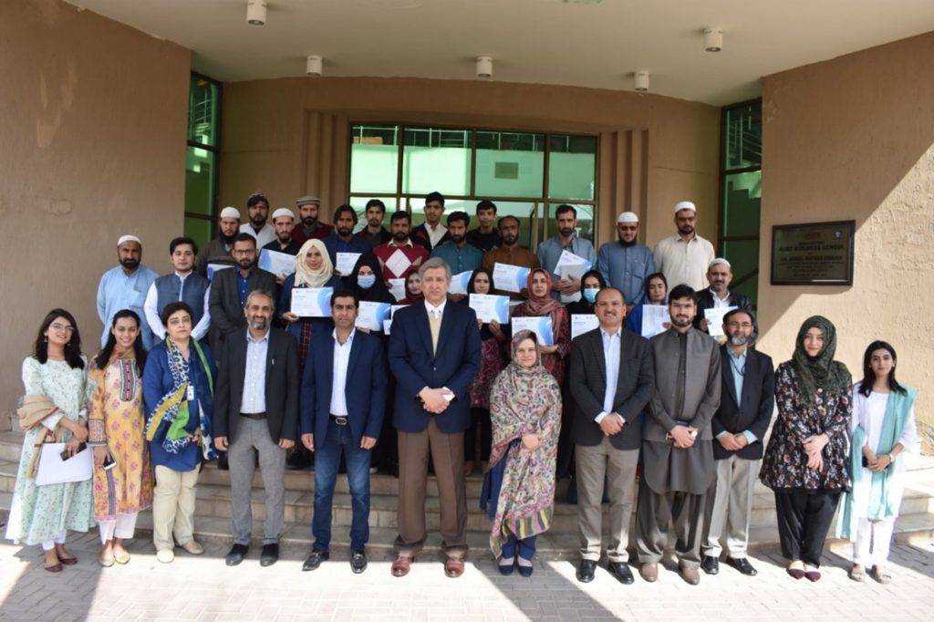 Figure 5: Training participants along with Principal and faculty of NBS, NUST posing for a group photo